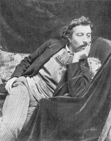 Photo de Paul Gauguin assis, tête appuyée sur une main